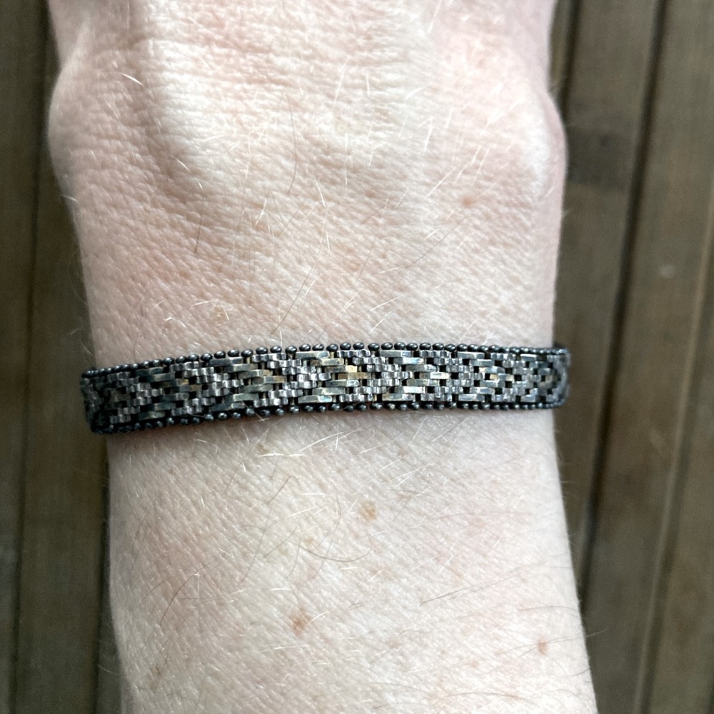 Beautiful deep bronze and pewter toned bracelet, in an intricate chevron design.